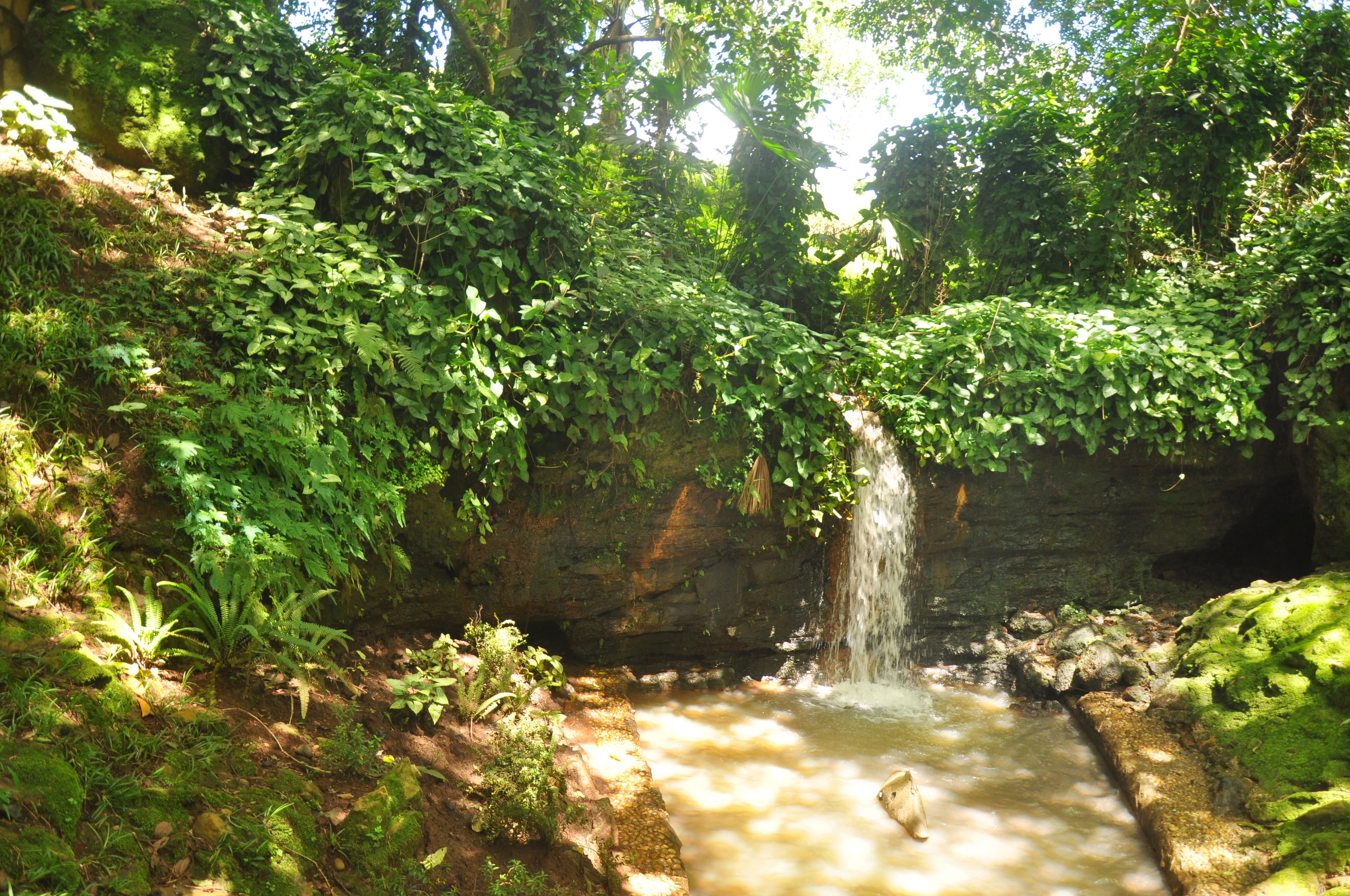 A waterfall and cave at Katasiha Fort near Hoima